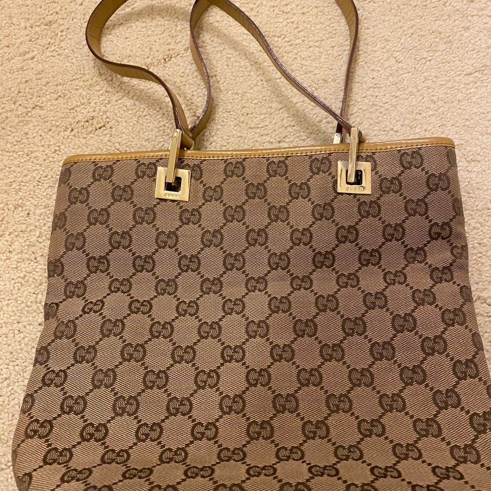 Gucci small tote 9 inches high by 10 inches wide